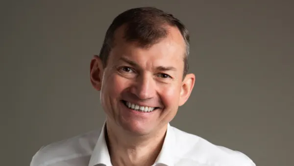 A headshot of Alex Lugovskoy.