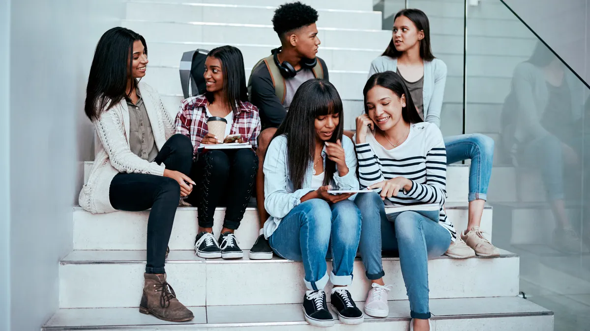 College students hanging out on campus