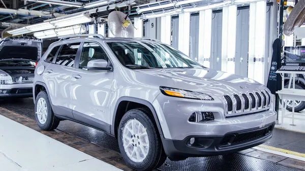 A fifth-generation silver Jeep Cherokee SUV on the inspection line at Stellantis' Belvidere assembly plant in Illinois.