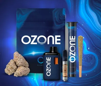 Various cannabis products next to a pouch with a dark blue background that has Ozone branding.