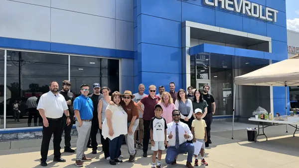 Jay Trivedi and Jay's Chevrolet staff, at Fourth of July celebration