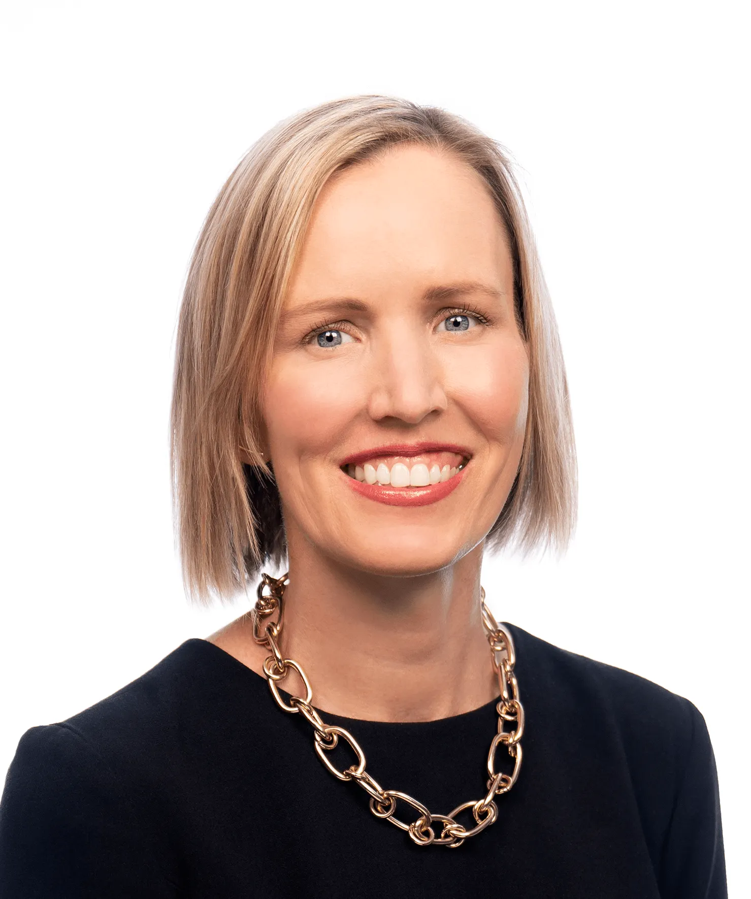 A head and shoulders photo of a person against a white background