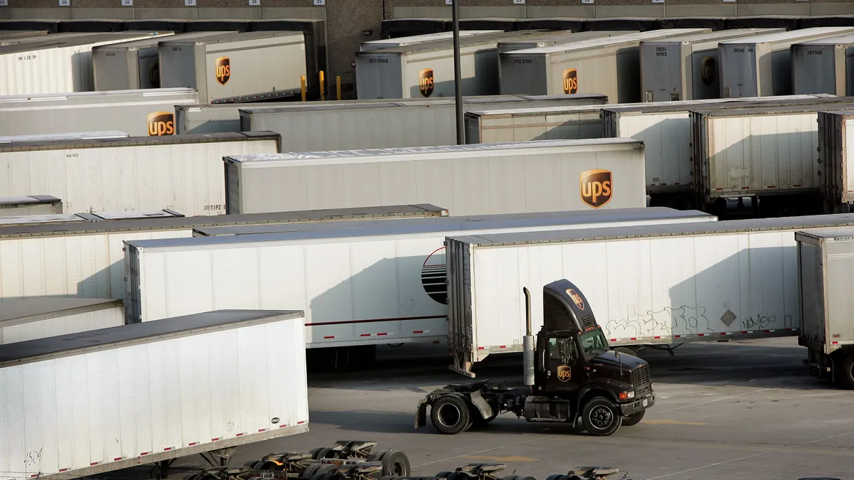 A truck moves through UPS' Chicago Area Consolidation Hub on the company's busiest day of the year December 20, 2005 in Hodgkins, Illinois.