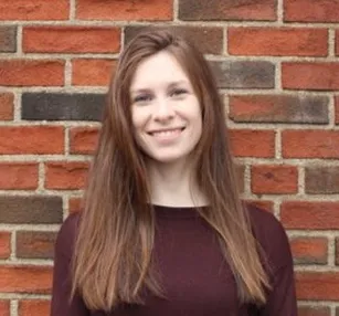 A headshot of Kate Cochran, managing director of The National Partnership for Student Success.