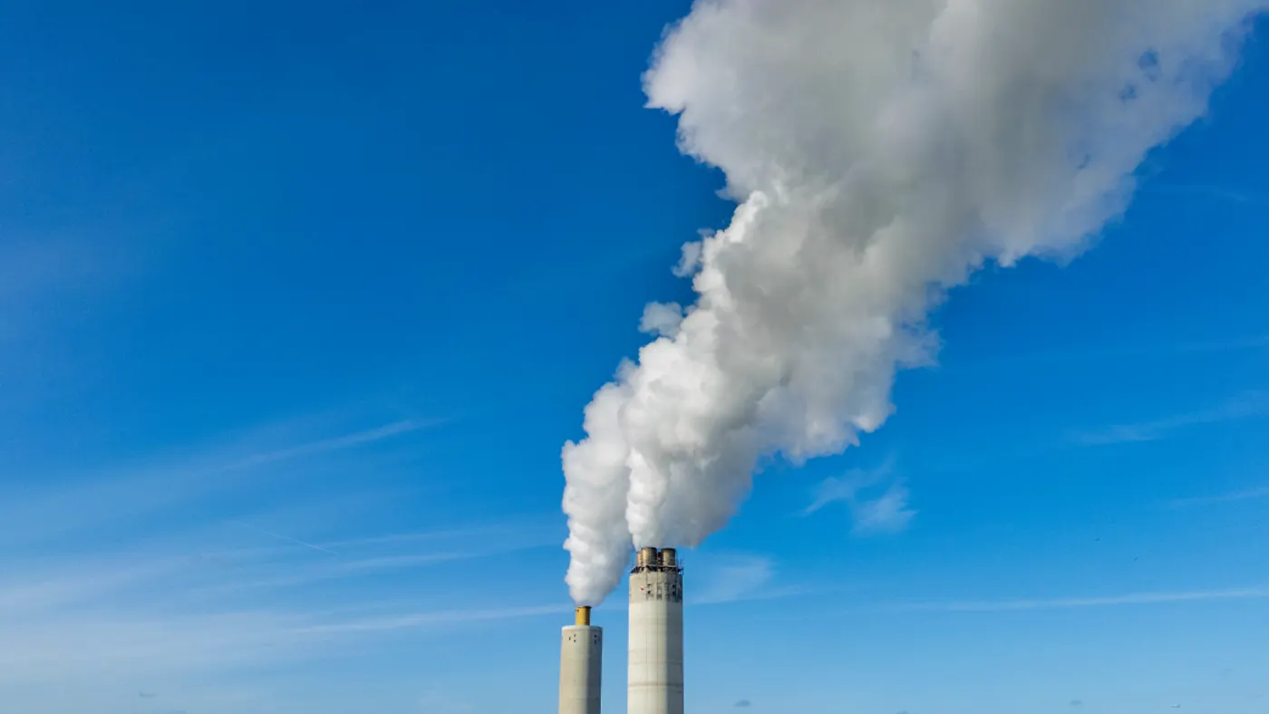 View of the sky with chimney gas flowing