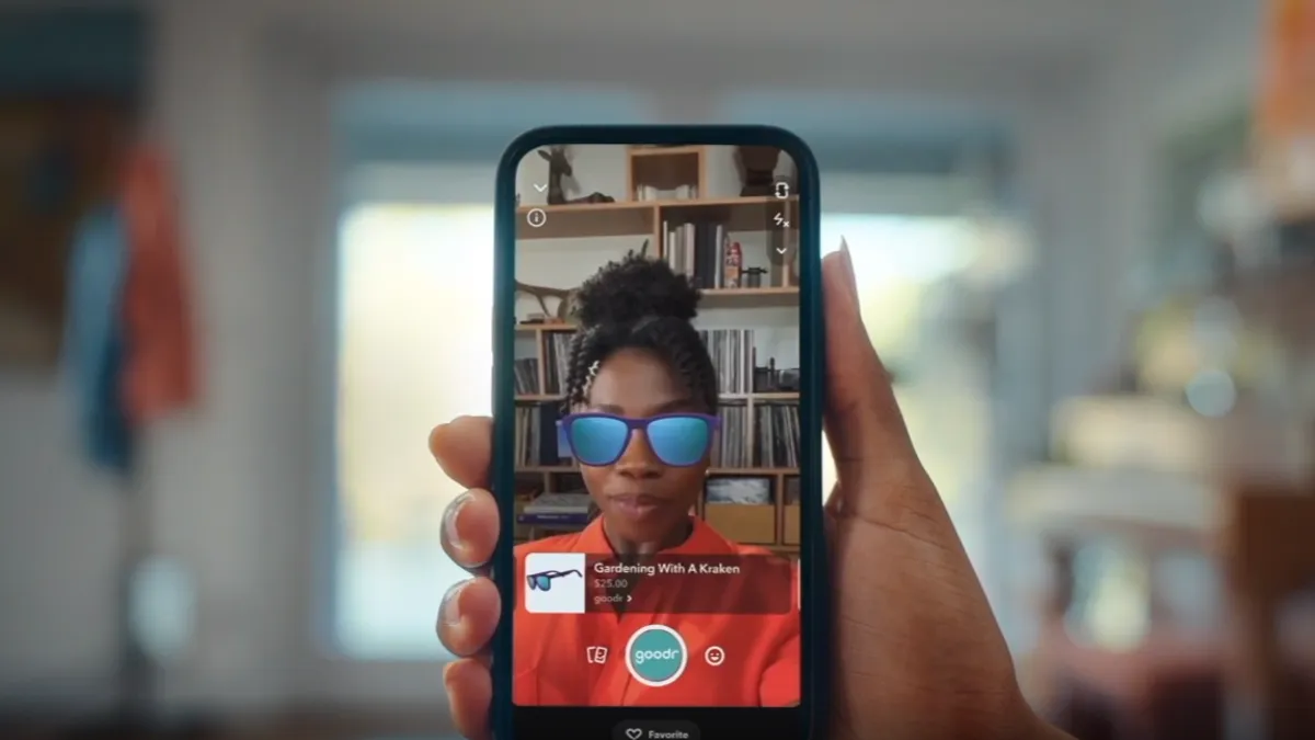 Person uses Goodr AR lens on Snapchat