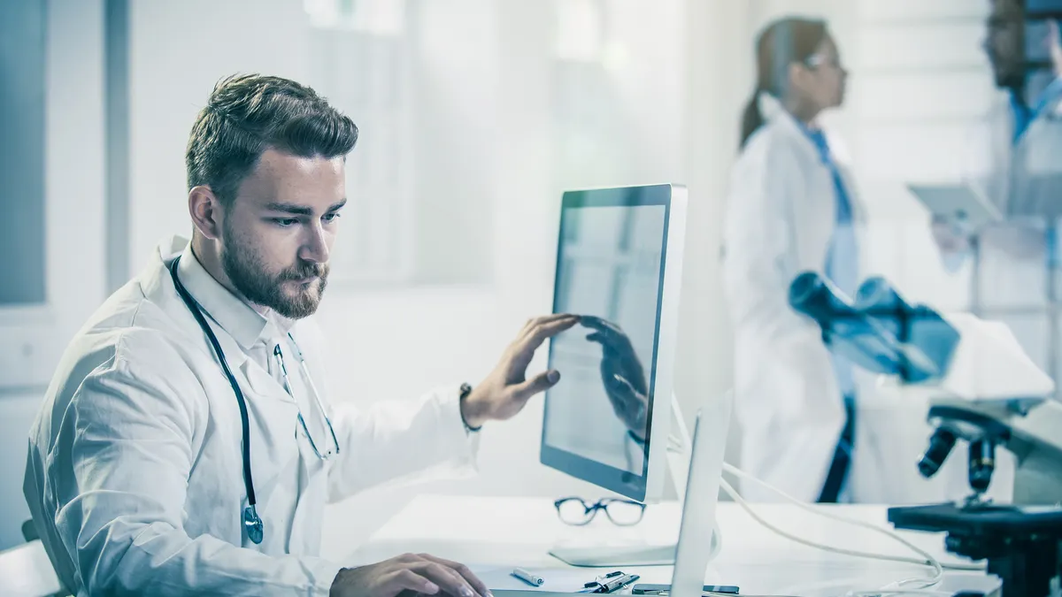 Doctor using computer