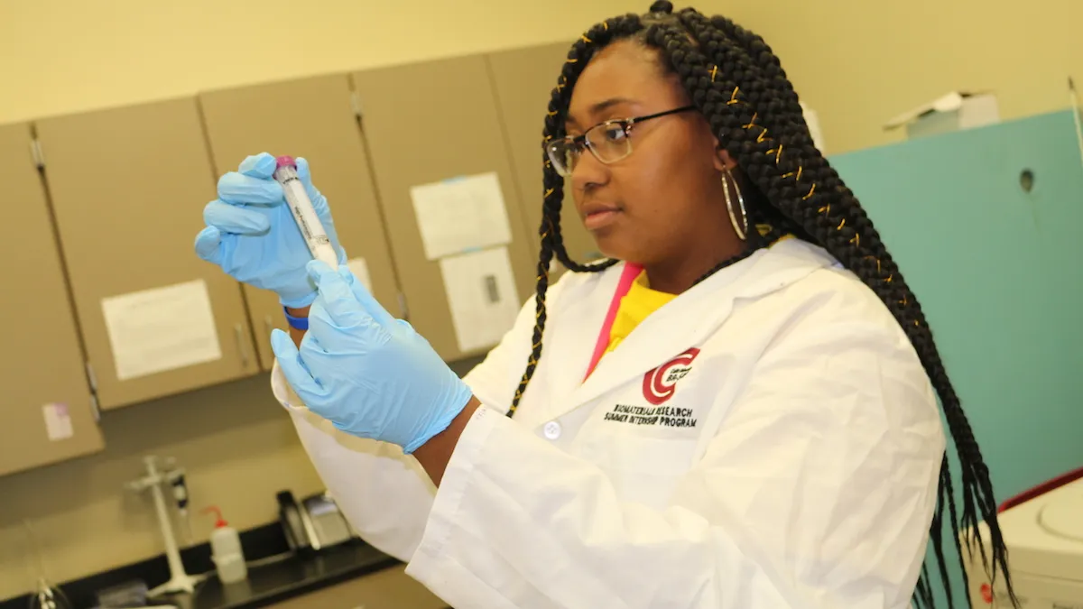 A female student participates in STEM learning.