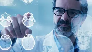 Doctor pointing to body scan results