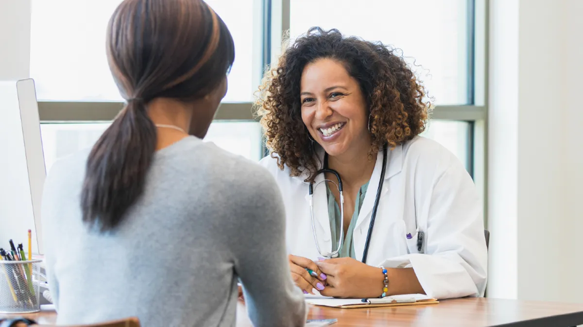 Doctor consulting with patient