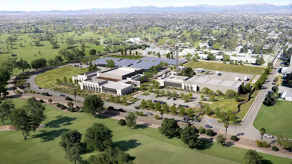 A rendering depicts a sprawling emergency operations campus with several buildings, parking lots and a field of solar panels.