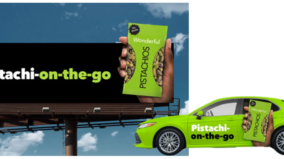 A billboard a green car wrap showcases Wonderful Pistachios' on-the-go campaign promoting its No Shells product.