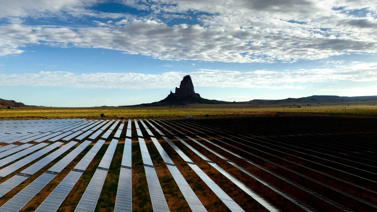 A massive solar farm in a desert landscape
