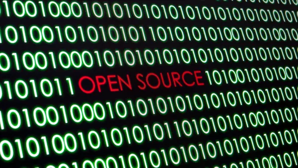 Close up of Open source text on binary codes