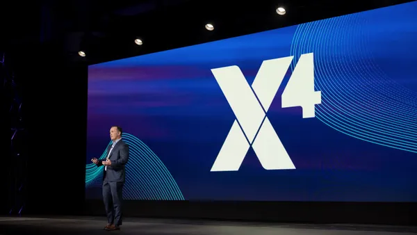 A man speaks on stage.