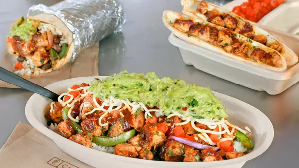 Several Chipotle items with the brand's version of chicken al pastor.