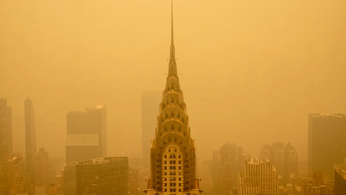 Smoky haze from wildfires in Canada diminishes the visibility of the Chrysler Building on June 7, 2023 in New York City.