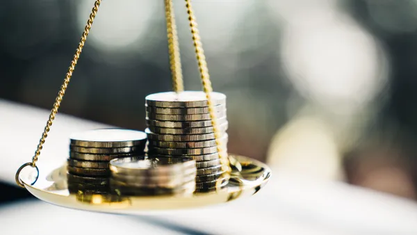 Stack of coins on a scale