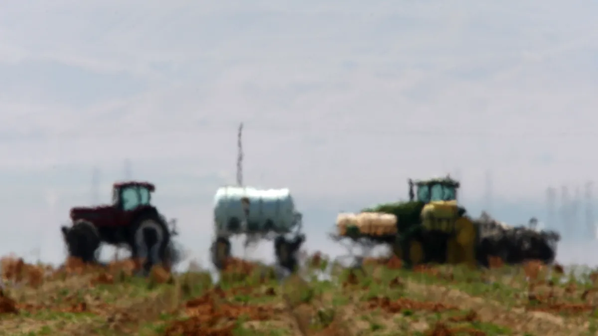 Farm equipment is seen warped by heat