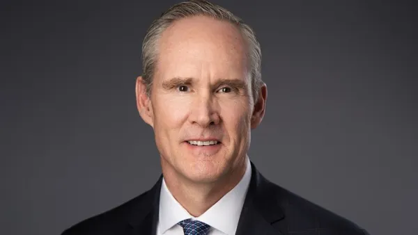 A headshot of new Olympus CEO Bob White.