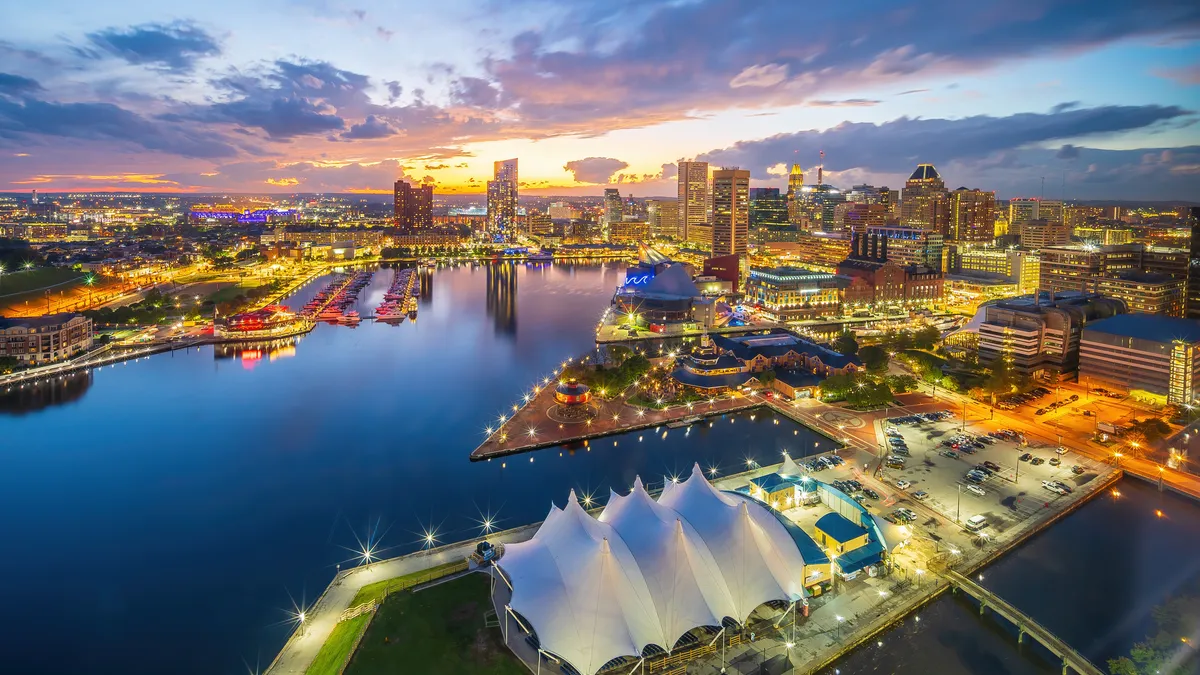 An aerial view of a city on the water.