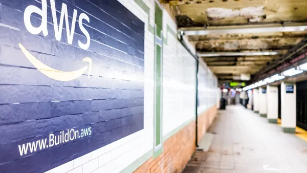 Amazon Web Services AWS advertisement ad sign closeup in underground transit platform in NYC Subway Station.