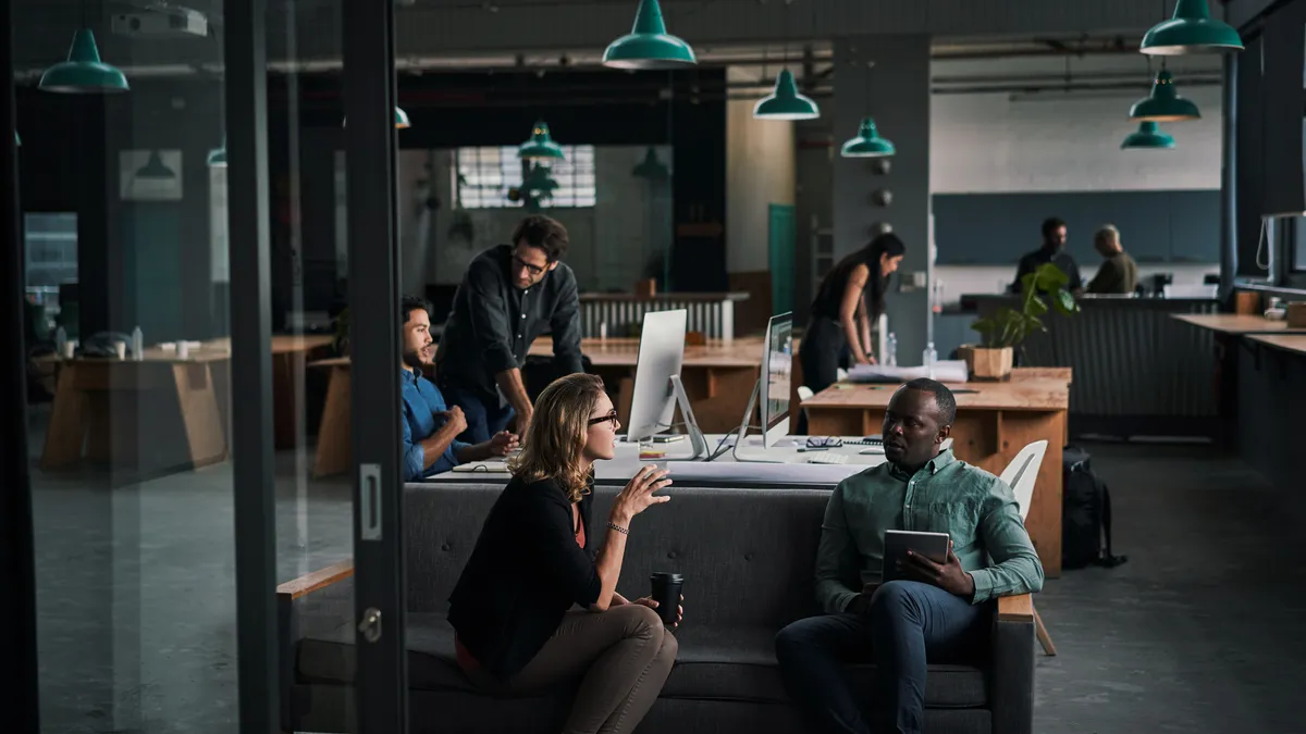 Businesspeople in a modern office.