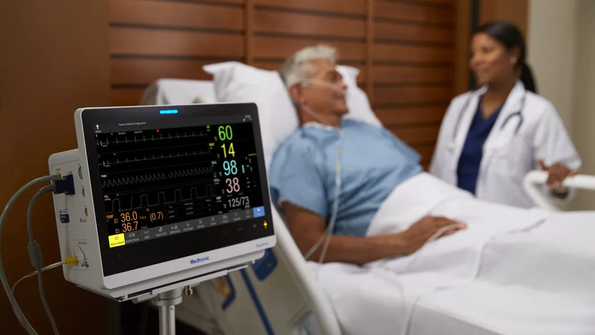 A patient being monitored in a hospital bed