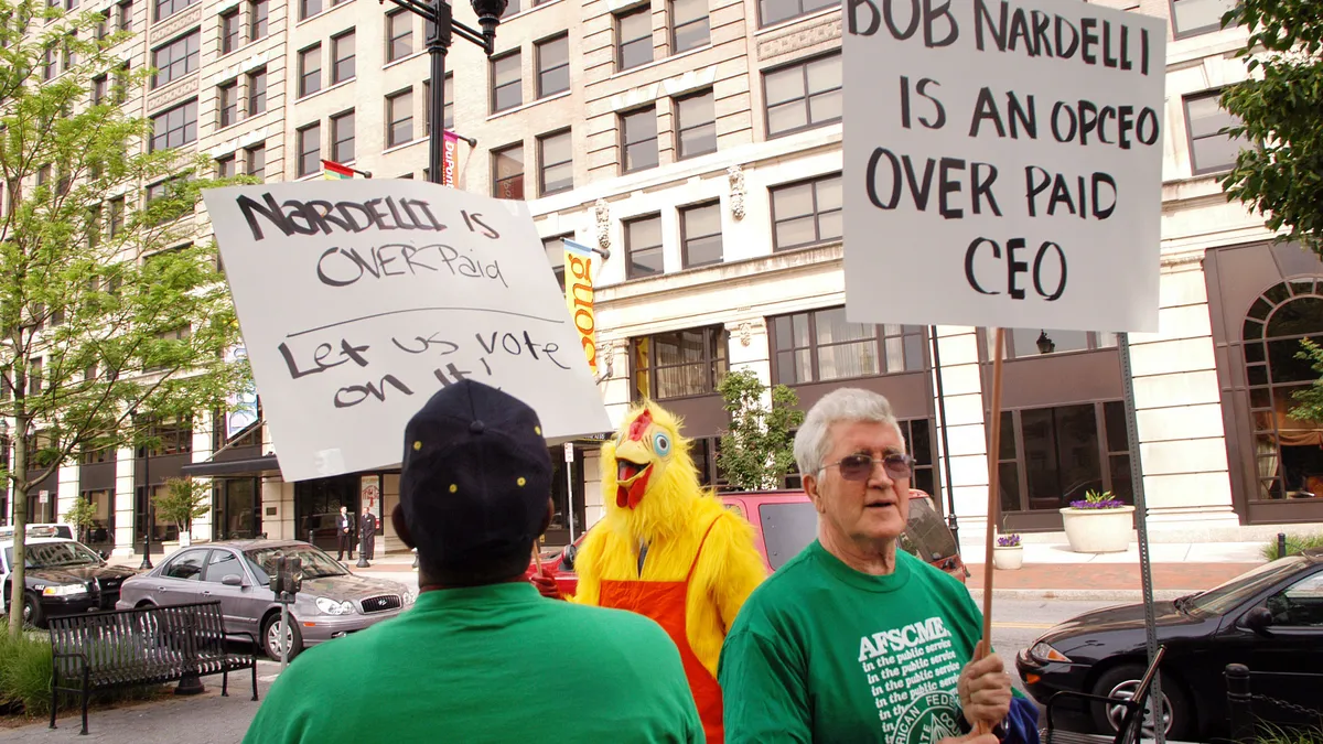 Protesters from AFSCME and the AFL-CIO outside the Hotel DuPont in Wilmington, Delaware.