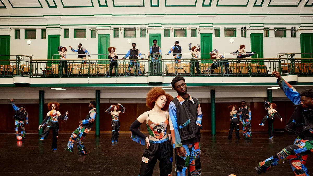 A promotional images shows several models posing in a gym wearing recycled clothing designed by Andrew Burgess for Puma.