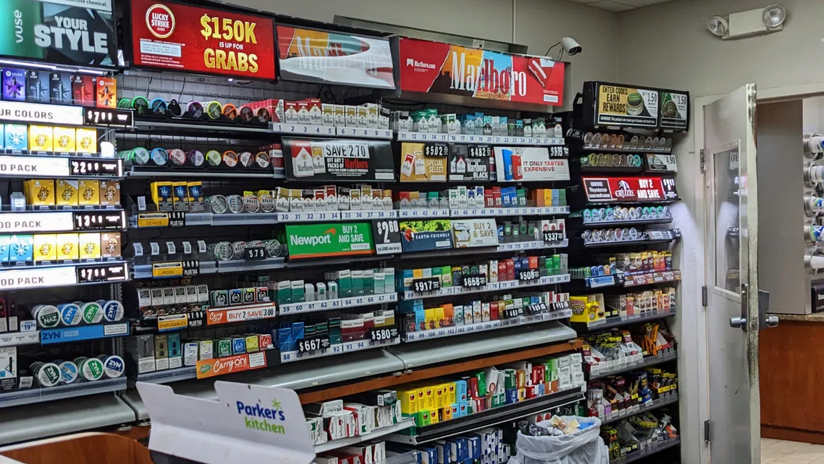 Tobacco and vape products for sale behind the counter at Parker's convenience store