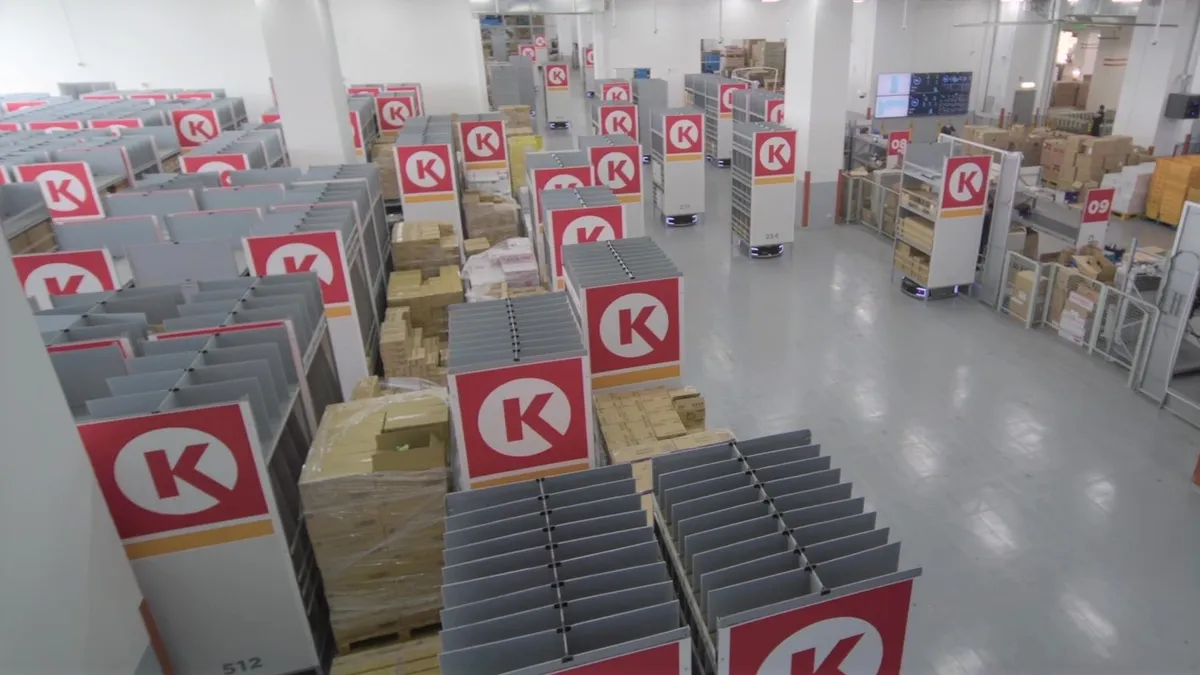 Photo of Geek+ robots in the distribution center of Circle K Hong Kong, provided June 2021 with announcement of two companies working together.