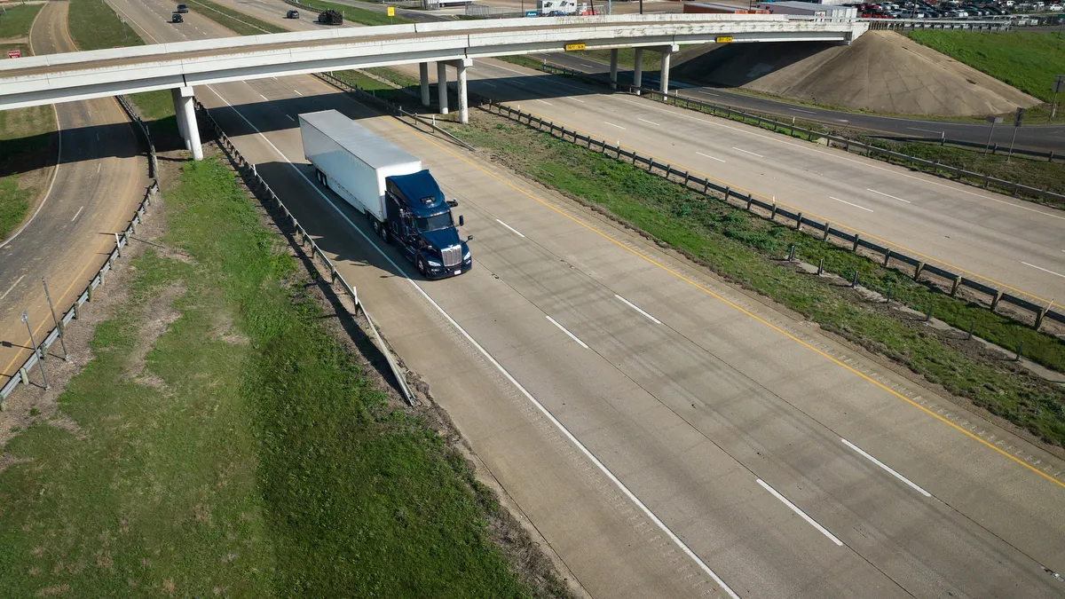 An Aurora self-driving truck on a highway.