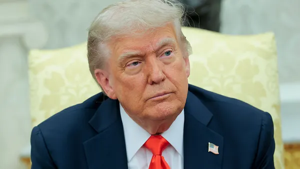 A headshot of Donald Trump.