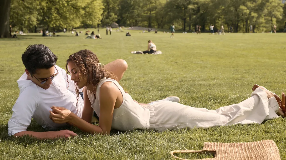 Two people in a New York City park for a Rhone campaign