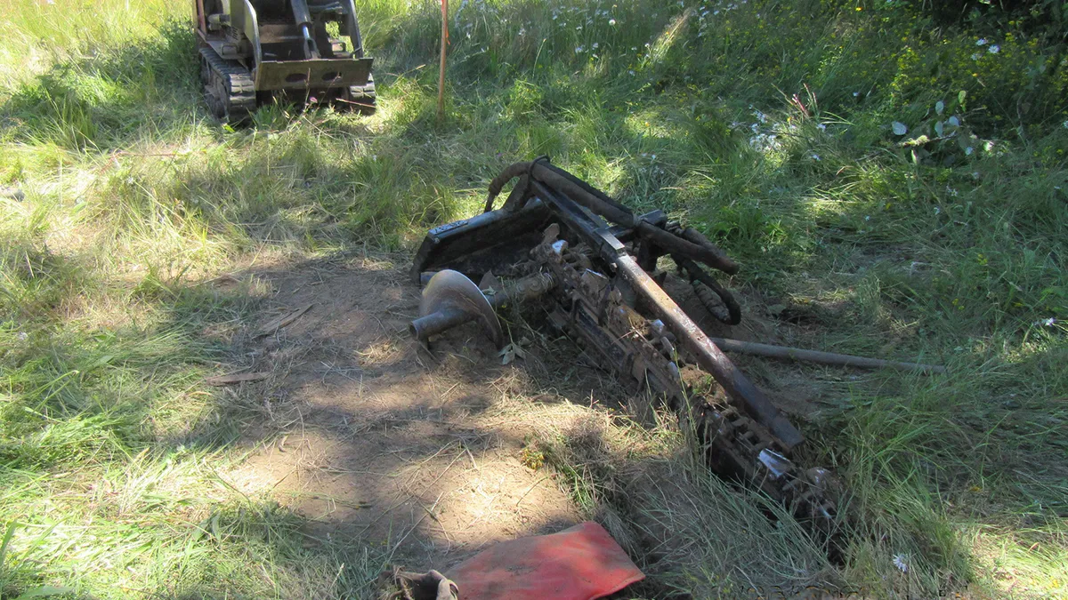 The Washington State Department of Labor & Industries shows the walk-behind trencher a 16-year-old boy was using when he was injured so severely he lost both legs to amputation.