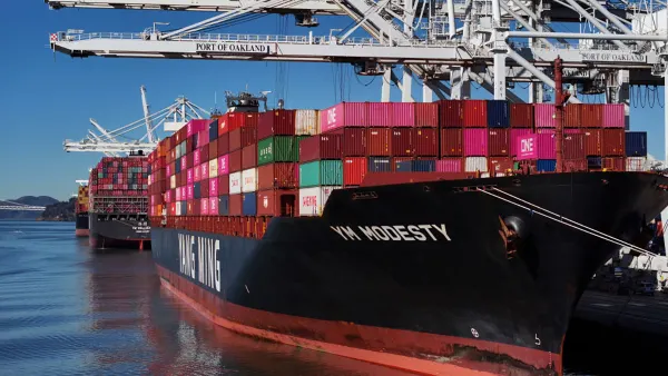 In an aerial view, container ships sit docked at the Port of Oakland on December 09, 2024 in Oakland, California