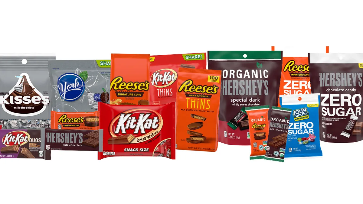 Several packages of Hershey chocolate products, including York, Kit Kat, Reese's and Hershey brand candies.