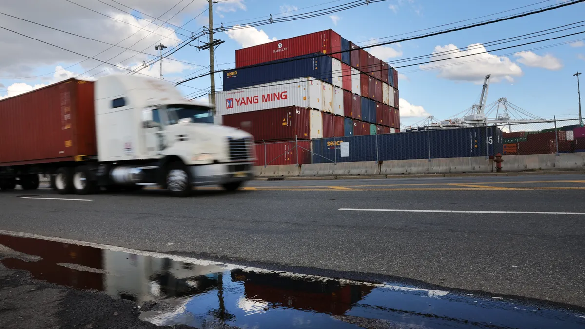 A truck passes a Port of New York/New Jersey container terminal.