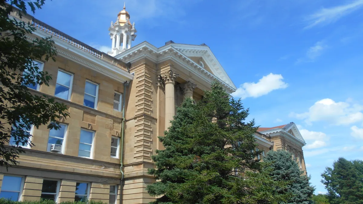 Building facade at Western Illinois University, seen from below.