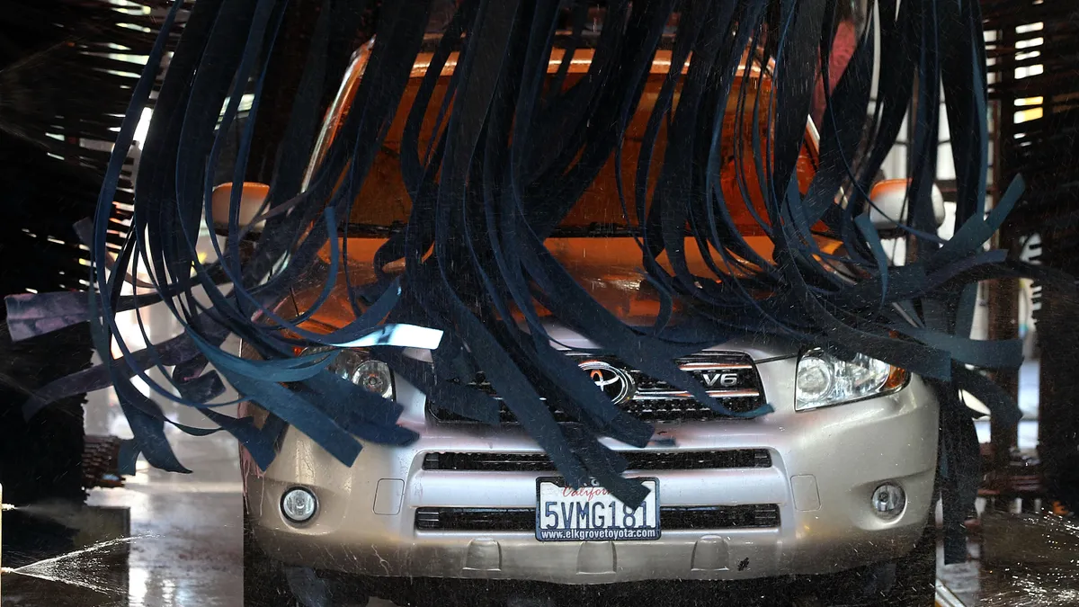 A photo of a car going through a car wash in California.