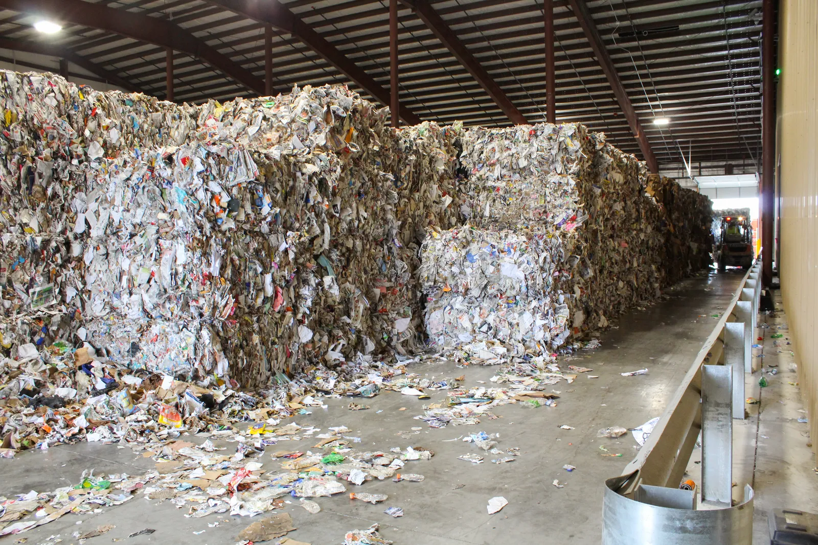 Bales of material that were sorted and await transport out of a Chicago recycling facility.