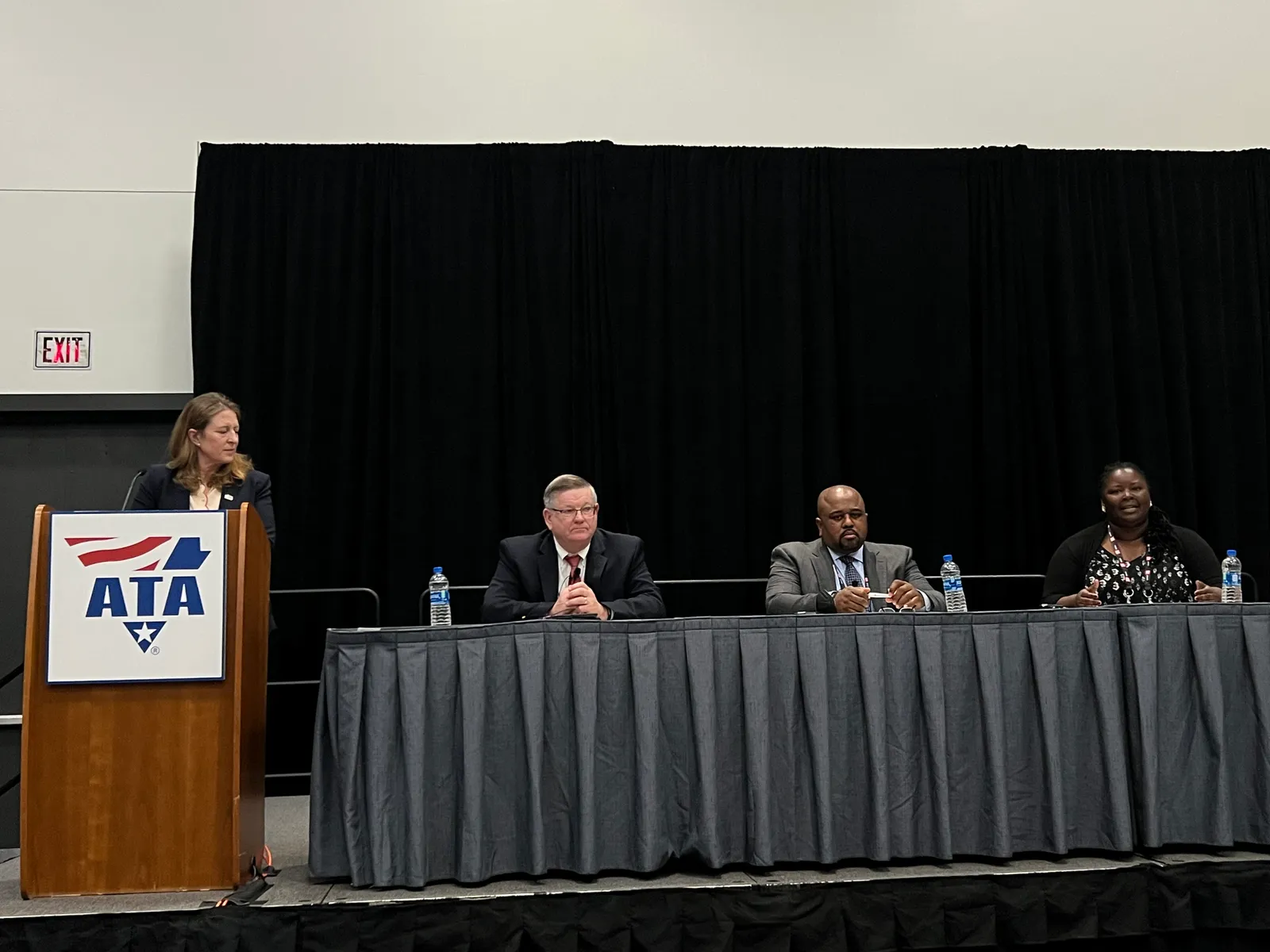 (From left to right) FMCSA head Robin Hutcheson, Executive Director Jack Van Steenburg, Chief Counsel Earl Adams Jr. and Director of External Affairs Kala Wright take questions at ATA MCE 2022.