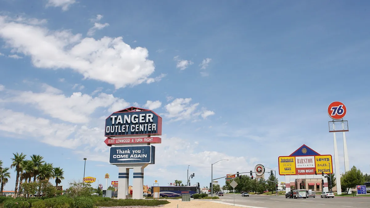 Tanger Outlet Center sign from afar