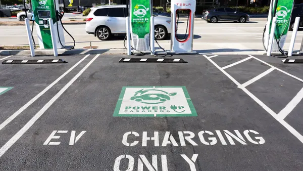 An 'EV Charging Only' sign is seen at a Power Up fast charger station for electric vehicles