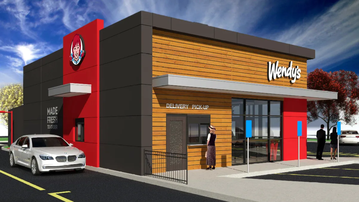 Wendy's Global Next Gen store design features a pick-up window for delivery orders and in-store shelving for digital pick-up orders.