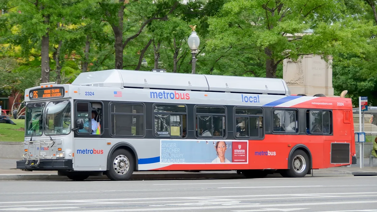 A driver and people on a metrobus in Washington D.C., on June 5, 2012.