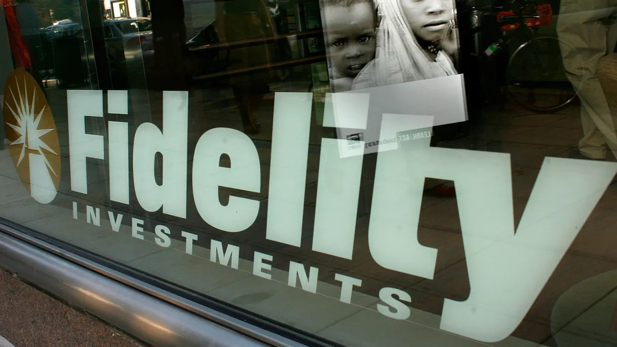 A picture of the front window of a Fidelity Investments Investor Center.