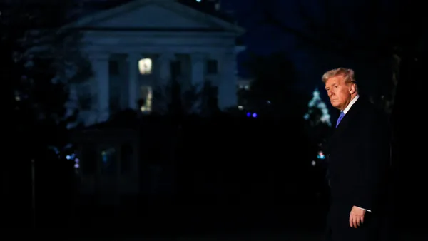 President Donald Trump walks across the South Lawn at the White House on March 9, 2025.