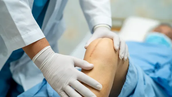 A patient recovers after a total knee replacement surgery.